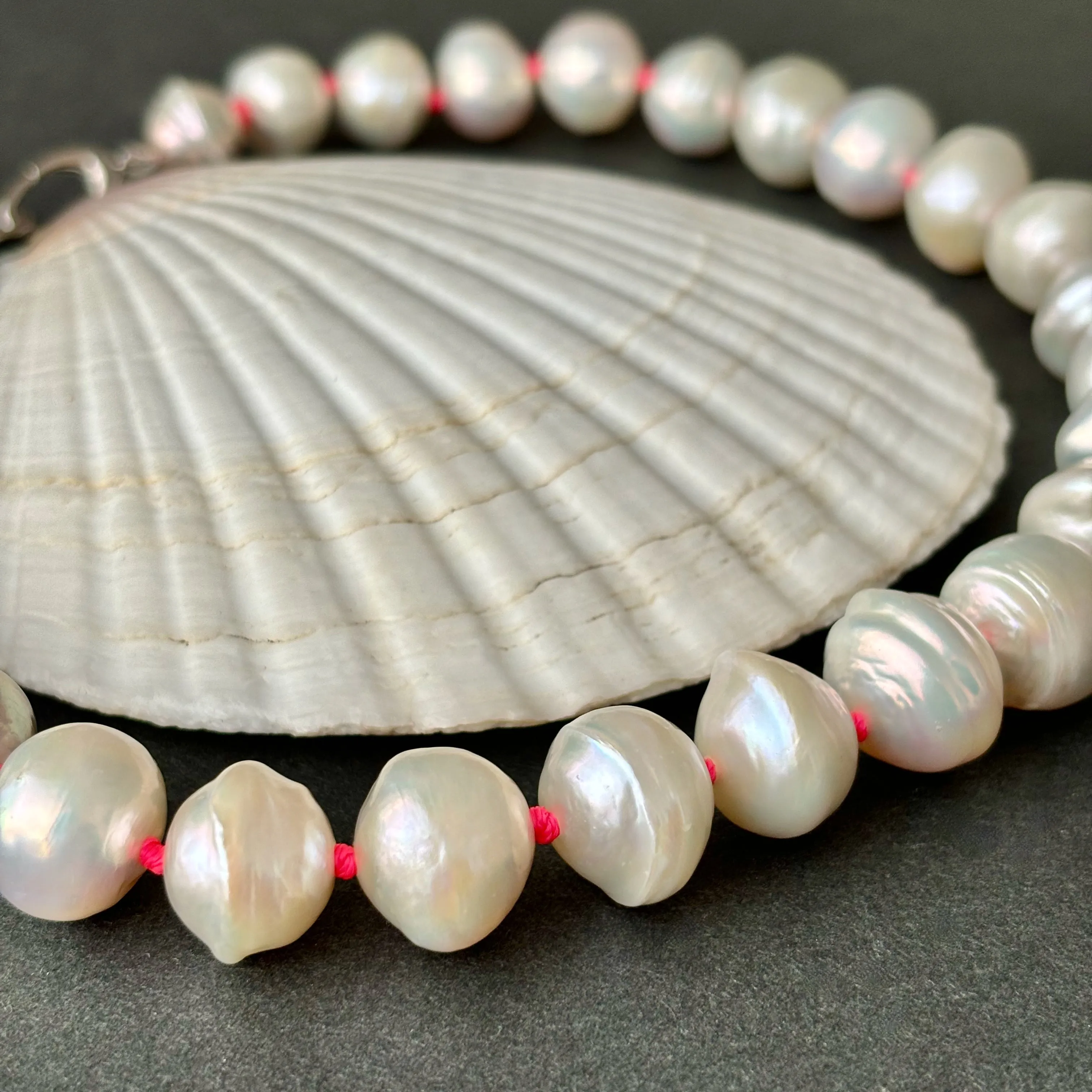 banded white "saucer" pearls on neon knots