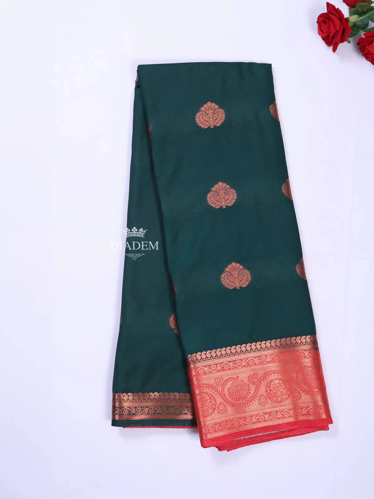 Dark Green Art Silk Saree with Zari Butta on the body and Contrast Zari Border